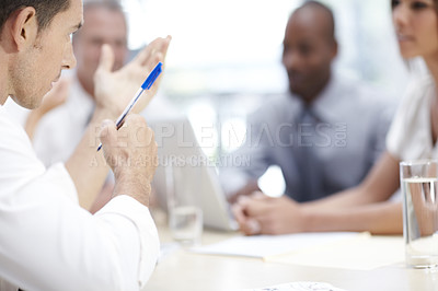 Buy stock photo A group of businesspeople finding solutions to project problems