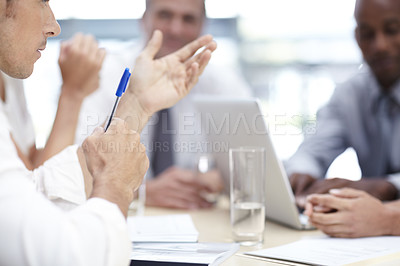 Buy stock photo A group of businesspeople brainstorming together in the boardroom