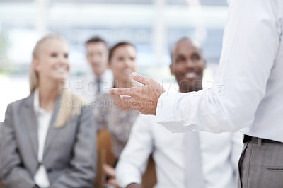 Buy stock photo A businessman leads a seminar for colleagues