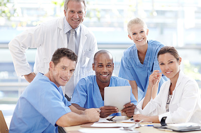 Buy stock photo A team of happy medical professionals