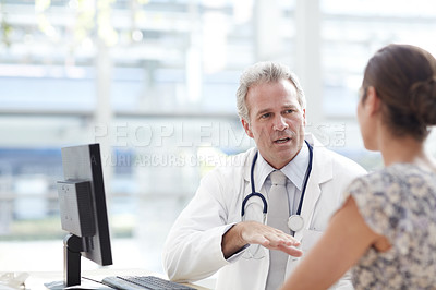 Buy stock photo Doctor and patient in a doctor's office