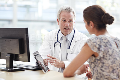 Buy stock photo Doctor and patient in a doctor's office