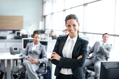 Buy stock photo Pretty young businesswoman standing confidently in the office - portrait