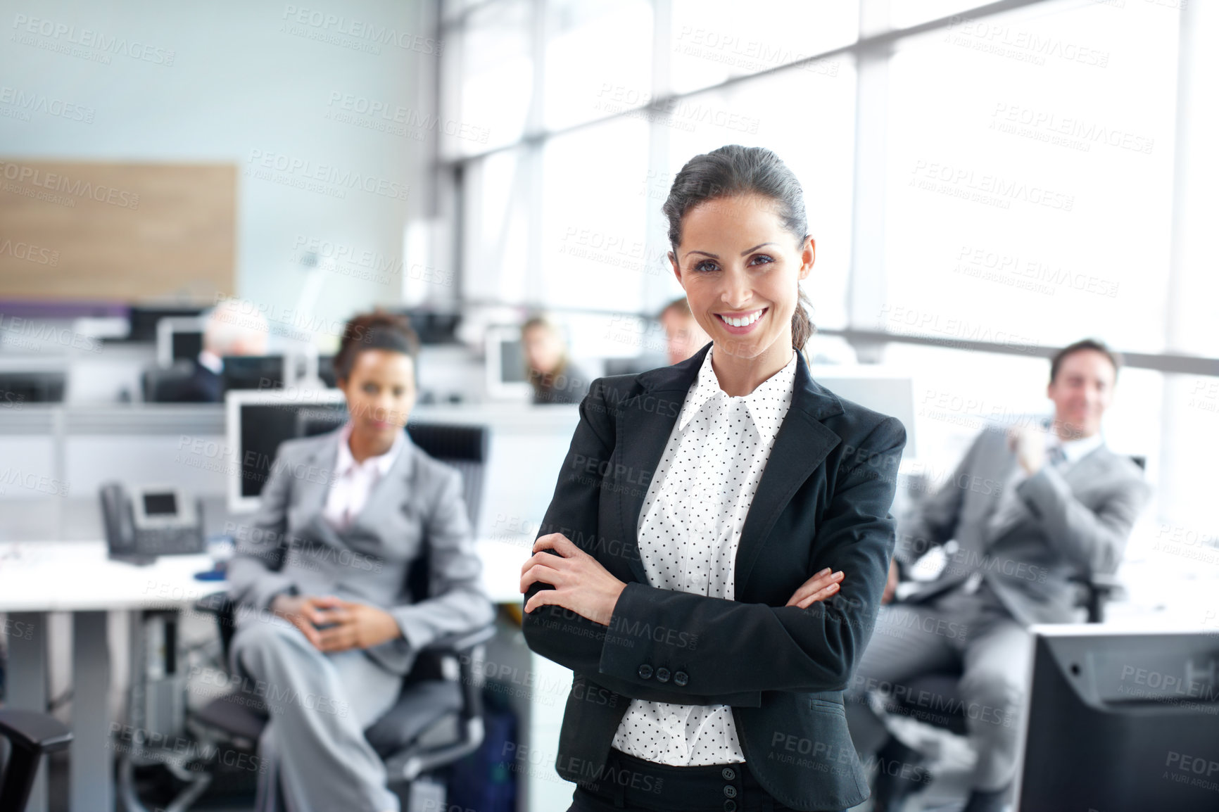 Buy stock photo Pretty young businesswoman standing confidently in the office - portrait