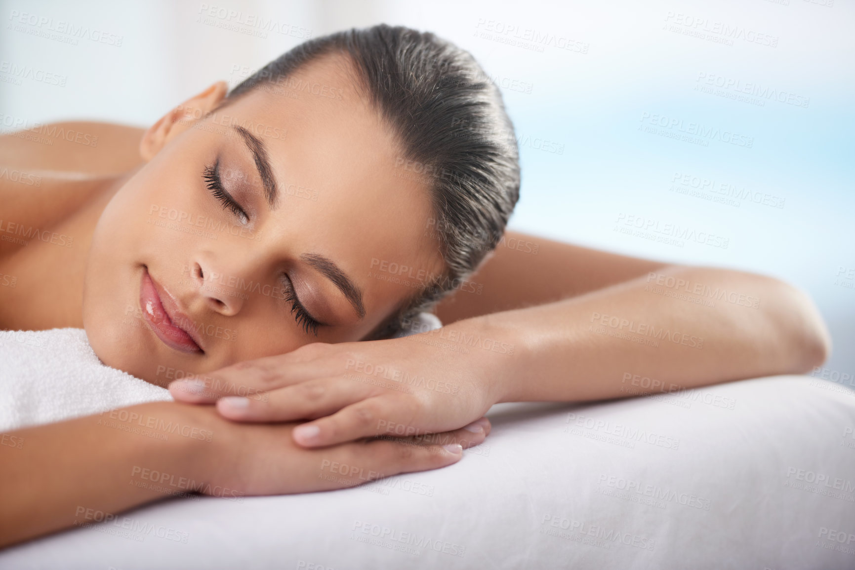 Buy stock photo Relax, sleeping and woman at spa with wellness, self care and luxury skin treatment for zen. Calm, cosmetics and young female person with beauty body routine taking nap on towel at health salon.