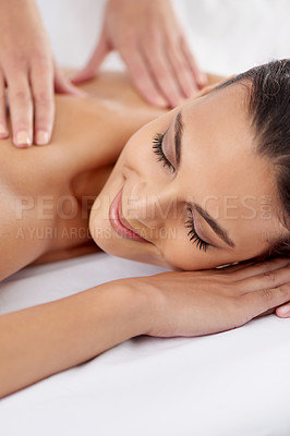 Buy stock photo Smile, woman and hands massage body for skincare, beauty and pampering back for wellness at luxury salon. Therapist, table and person at spa for treatment, peace and relax for health with masseuse