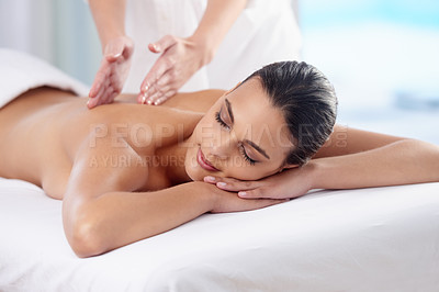 Buy stock photo Cropped shot of a beautiful young woman relaxing during spa treatment