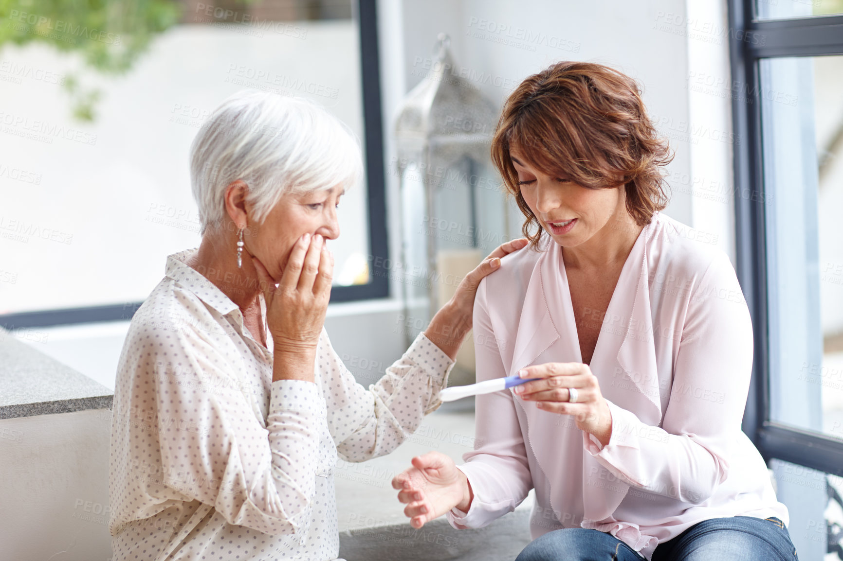 Buy stock photo Home, senior mom and shocked with pregnancy test, unhappy and people with negative results and check. Reading, stick and surprised by bad news in lounge, women and support for IVF fail or infertility