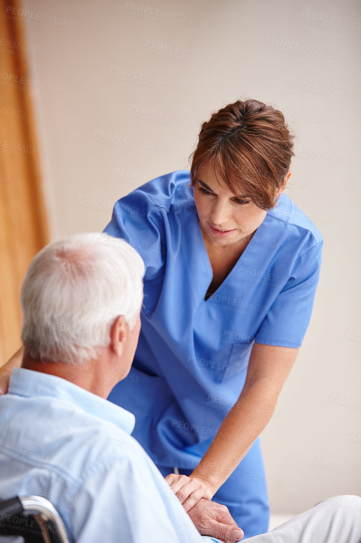 Buy stock photo Cropped shot of a female nurse checking on her senior patient