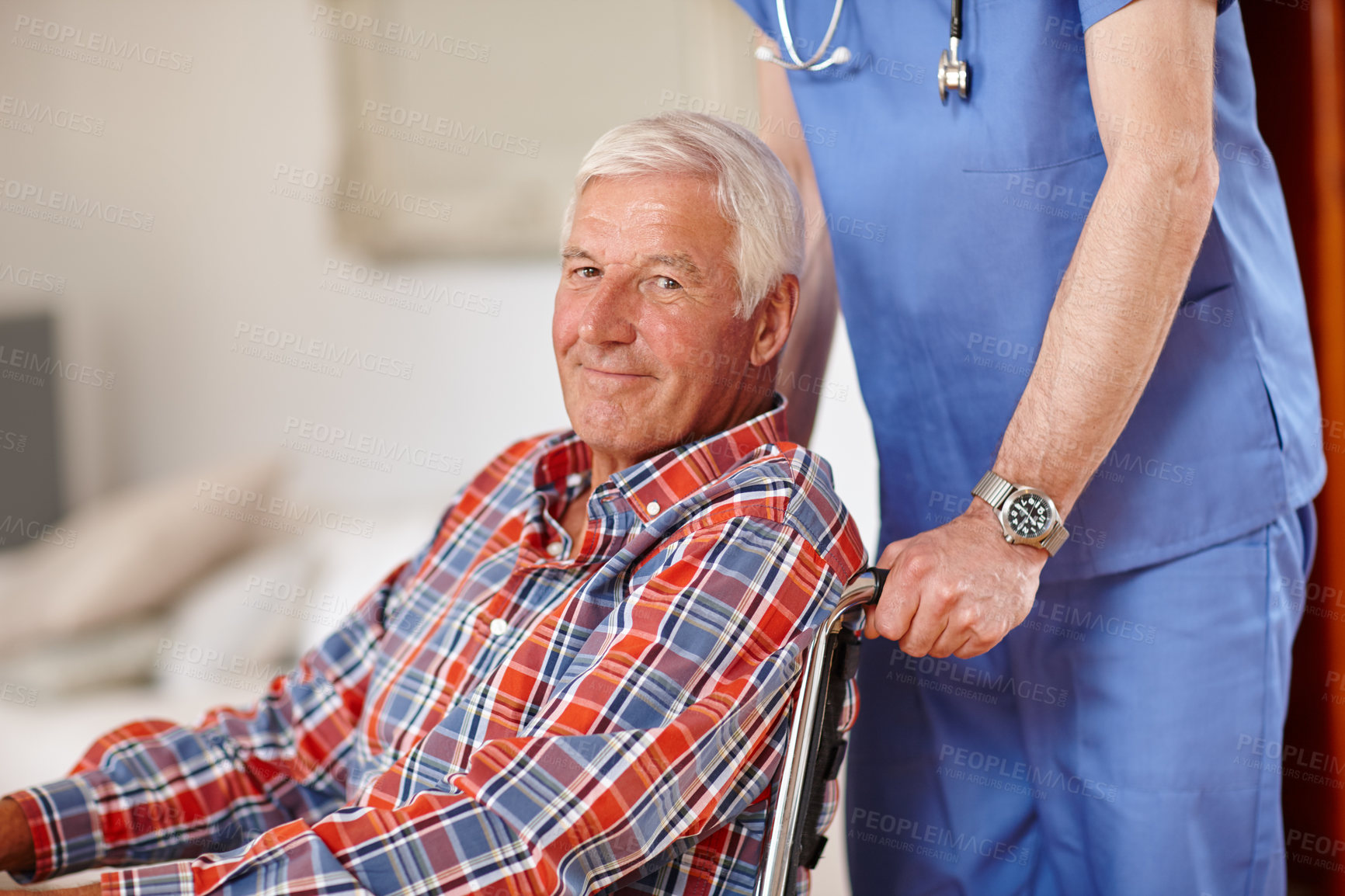 Buy stock photo Cropped shot of a senior man being pushed in a wheelchair by a nurse