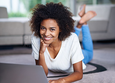 Buy stock photo Happy, laptop and portrait of woman on floor working on freelance creative project in living room. Smile, technology and female designer type on computer for research relaxing on carpet in apartment.