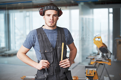 Buy stock photo Construction site, man and contractor in portrait for business, renovation project and industry job. Career, male person and engineer with machine equipment for maintenance, building and architecture