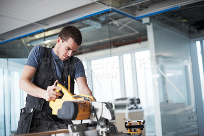 Buy stock photo Man, saw and contractor working on construction site, labor and power tools for building repair. Restoration, manual gear and cutting wood for renovation, professional and handyman for development