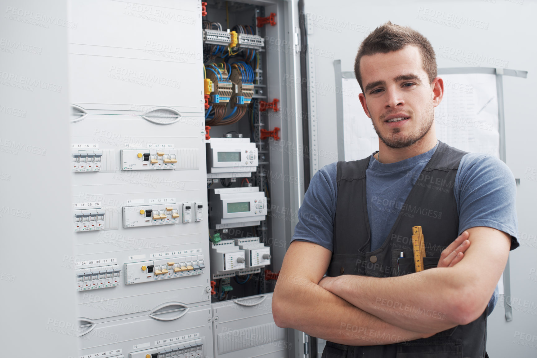 Buy stock photo Portrait, technician and man with arms crossed, power station and maintenance of cable system or supply. Contractor, electrical engineer and energy generation in control room, person and electrician