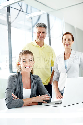 Buy stock photo Portrait of a successful team of professionals in casual wear in an office setting