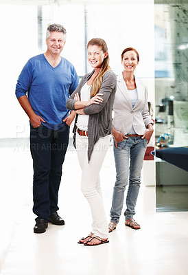 Buy stock photo Full-length portrait of three casual businesspeople standing next to each other