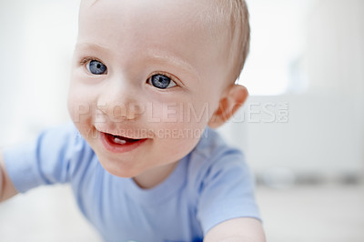 Buy stock photo A cute little baby boy smiling with two teeth