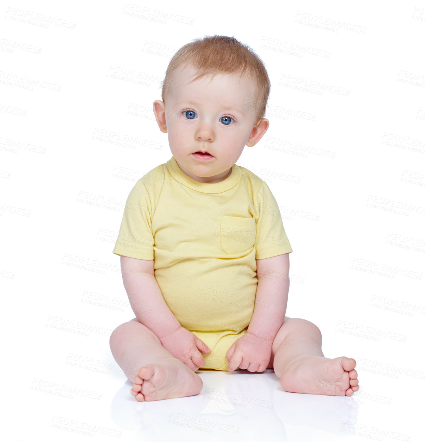 Buy stock photo Studio shot of a cute baby boy sitting on the floor