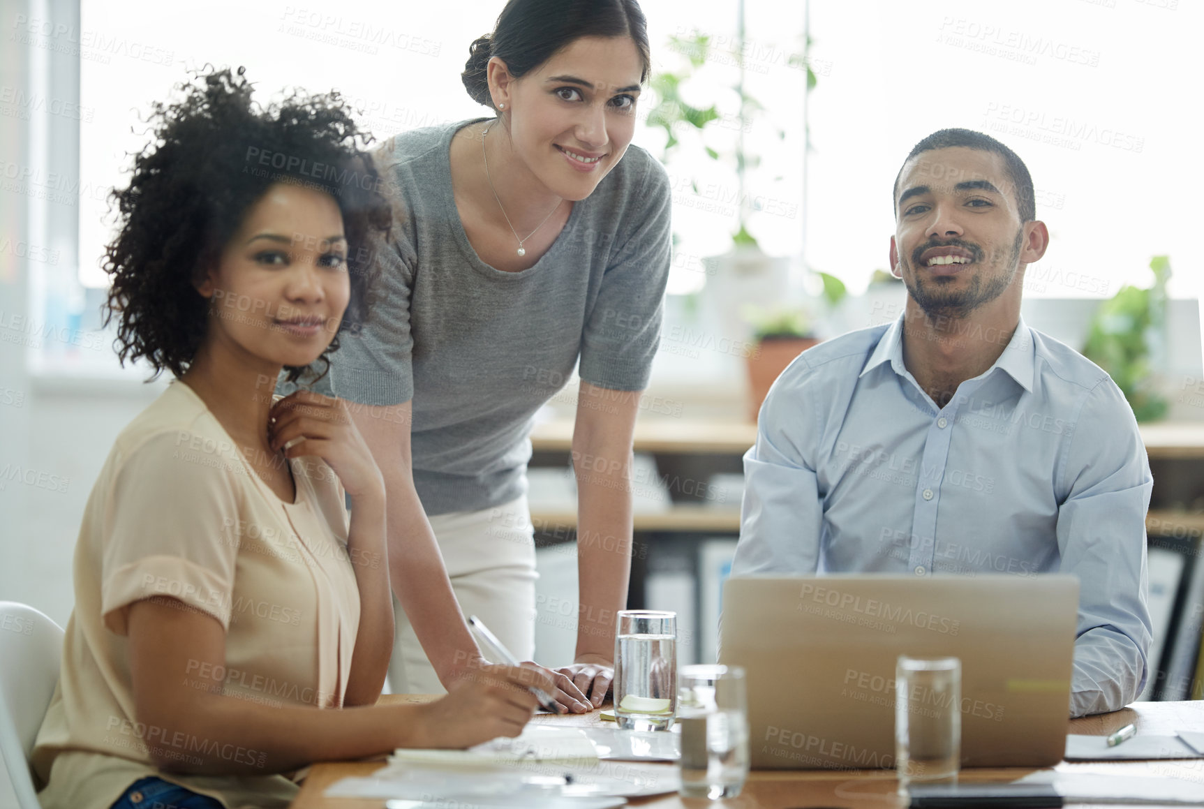 Buy stock photo Team, laptop and portrait of business people in workplace for planning, collaboration and strategy. Meeting, professional and diverse group of employees by technology for discussion, research or idea