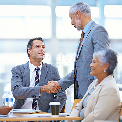 Buy stock photo Coworker, office and handshake with deal for success in business, contract and teamwork. Diverse, boardroom and smile for meeting achievement with congratulations as ceo or leader of company. 