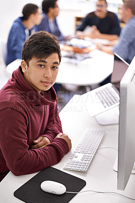 Buy stock photo Business man, computer and portrait at office desk for web development, programming or information technology. Young programmer, worker or online designer on multimedia, planning and startup project