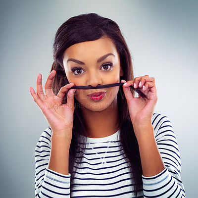 Buy stock photo Funny, portrait and woman with hair as mustache in studio, background and mockup space. Fashion. model and girl relax with silly face and creative quirky identity in style, clothes and hairstyle