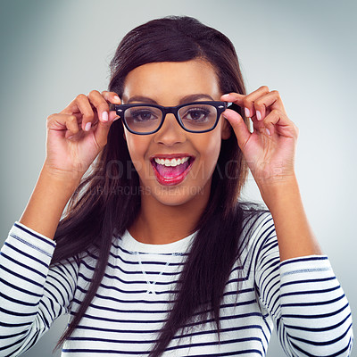 Buy stock photo Portrait, woman and eyewear in studio, glasses and excited expression on gray background. Eyesight, spectacles or optometry for model, vision and stylish or trendy prescription lens as eye care