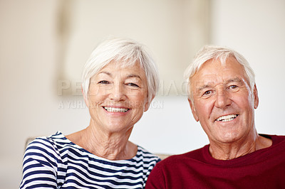 Buy stock photo Portrait of a loving senior couple at home