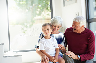 Buy stock photo Shot of a senior couple and their grandson