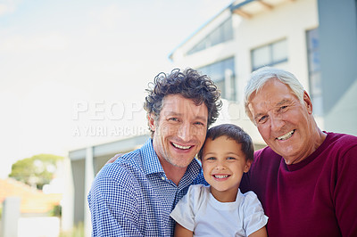 Buy stock photo Cropped portrait of a man standing outside with his father and son