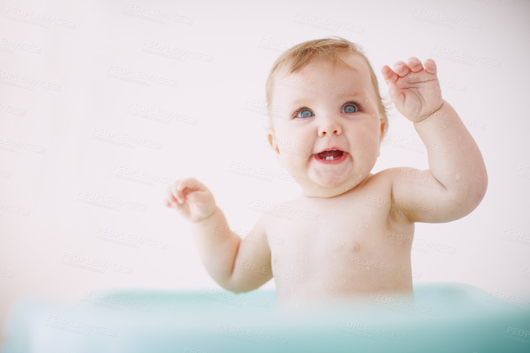 Buy stock photo A cute baby girl having fun in the bathtub