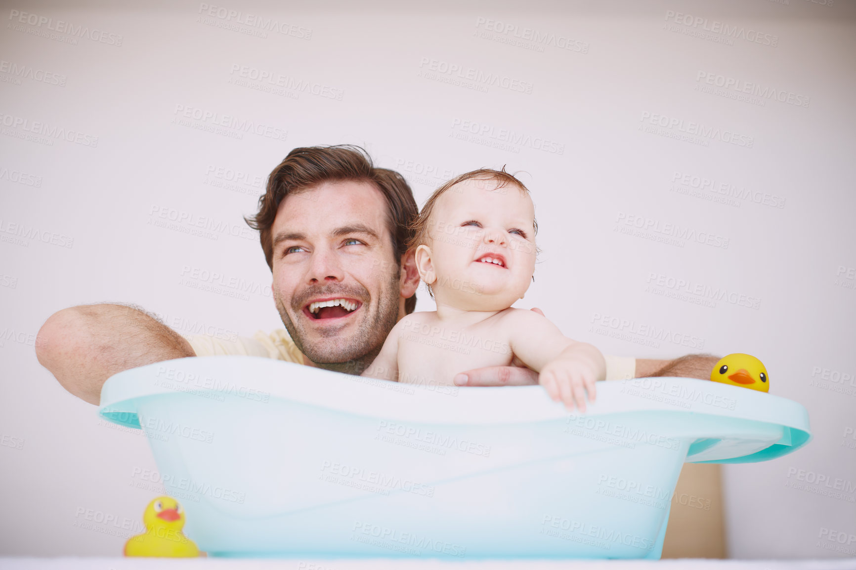 Buy stock photo Father, kid and baby in bathtub in home for cleaning, hygiene and wellness for health. Child, parent and infant wash in bathroom with dad for skincare, smile and morning routine with family happiness