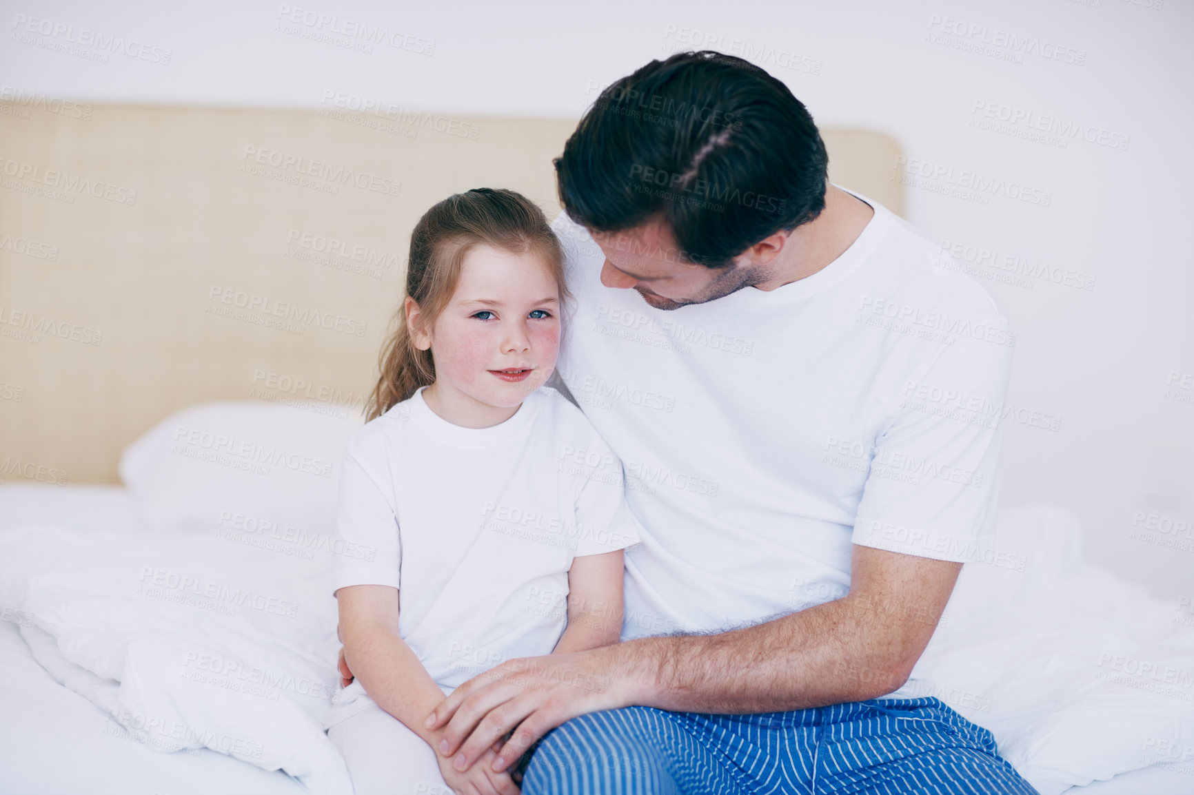 Buy stock photo Daughter, dad and morning for speaking in home, hug and love for kid in childhood relationship. Peace, portrait and embrace for protection or security, support girl and gratitude to father in bedroom