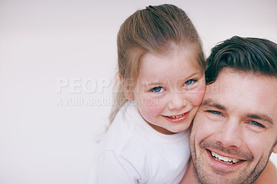 Buy stock photo An affectionate daughter embracing her father
