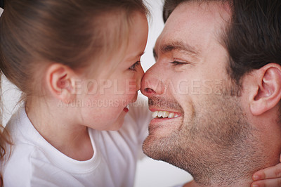 Buy stock photo Closeup shot of a father and daughter being affectionate towards each other