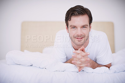 Buy stock photo Morning, man and relax with portrait in bed for weekend break, wake up or comfortable in hotel. Happy person, resting and lazy in cozy bedroom for vacation hospitality and peaceful at holiday home