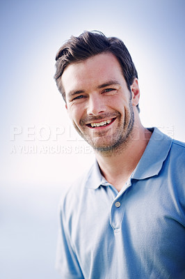 Buy stock photo Portrait of a handsome smiling man standing outside