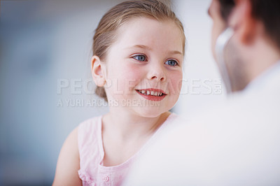 Buy stock photo Closeup shot of a little girl at a doctor's appointment