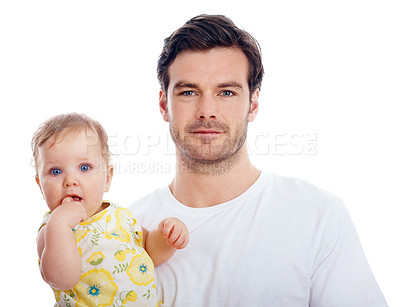 Buy stock photo Portrait of a proud young dad standing with his lovely baby daughter in his arms
