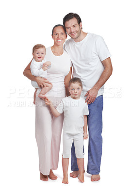 Buy stock photo Studio portrait of a family with two children dressed in casual wear