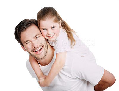 Buy stock photo Studio shot of a young dad carrying his little girl on his back