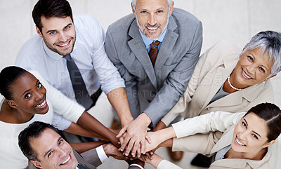 Buy stock photo Portrait, top view or business people with hands in stack for mission goals, collaboration or teamwork. Team building, smile or happy employees in meeting with support, solidarity or group motivation