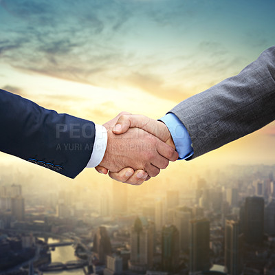Buy stock photo Shot of two businessmen shaking hands