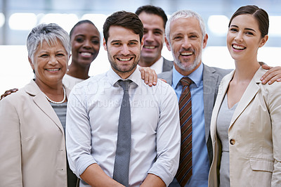Buy stock photo Cropped portrait of a group of businesspeople standing in the office