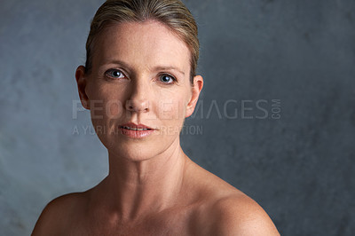Buy stock photo Mature woman, skincare model and portrait with natural beauty and cosmetic dermatology. Isolated, gray background and female person face with facial treatment and self care with anti aging cosmetics
