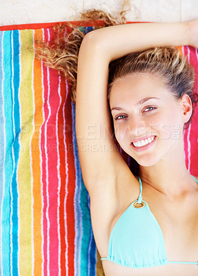 Buy stock photo Top view, towel and woman with a smile, portrait and vacation with adventure, relax and weekend break. Face, person and girl with joy, journey and peaceful with happiness, summer and getaway trip