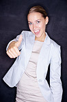 Excited business woman giving you an approval sign