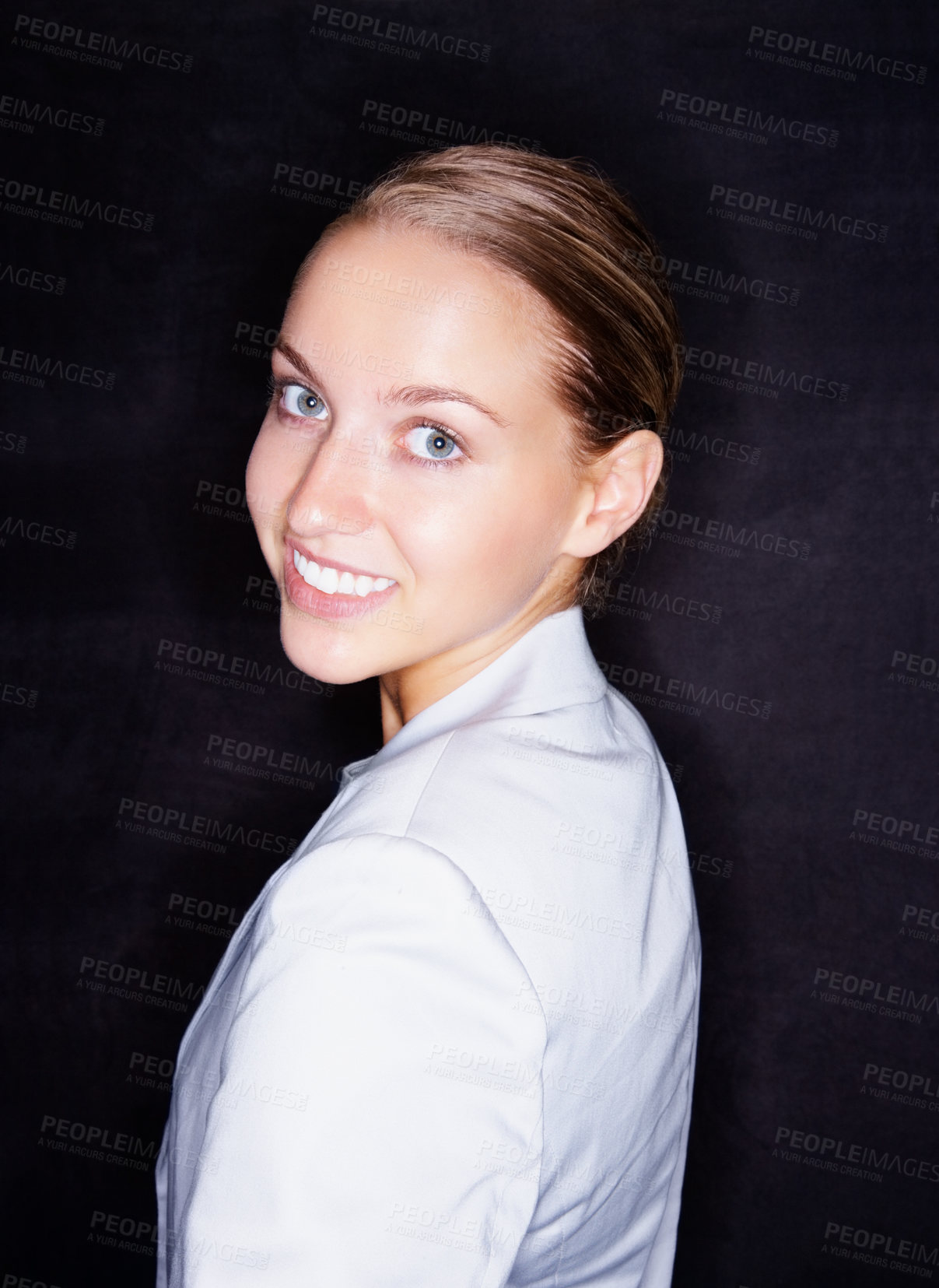 Buy stock photo Pretty smiling business woman isolated against black background