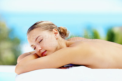 Buy stock photo Woman, sleeping and outdoor on bed at spa for health, wellness or recovery with rest, peace or quiet. Girl, sunshine and resort for rehabilitation, calm or physical therapy treatment for body fatigue