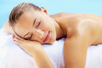 Buy stock photo Woman, sleeping and health on bed in spa to relax, wellness and recovery with rest, peace and quiet. Girl, calm and natural at resort for rehabilitation, blue sky or physical therapy for body fatigue